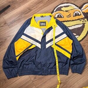 Totes navy blue windbreaker jacket with yellow accents (0128)